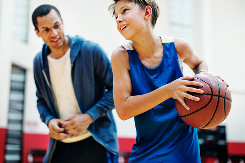 Young basketball player shoot